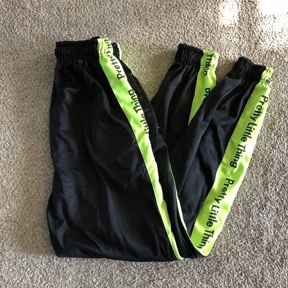Pretty Little Thing black with neon stripe windbreaker joggers in size 2
